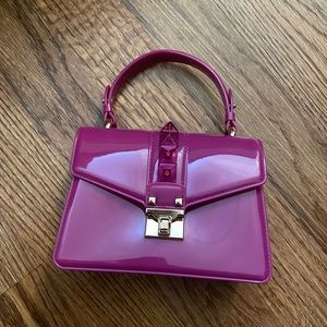 magenta studded purse